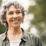 woman smiling dentist in euless