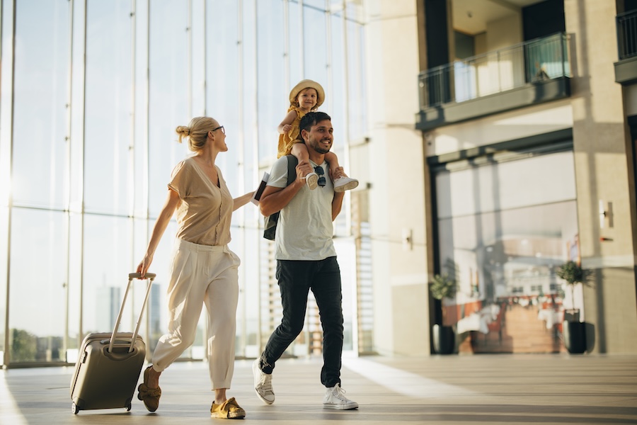 family on vacation but their teeth don't know they're on vacation, still need to maintain oral health