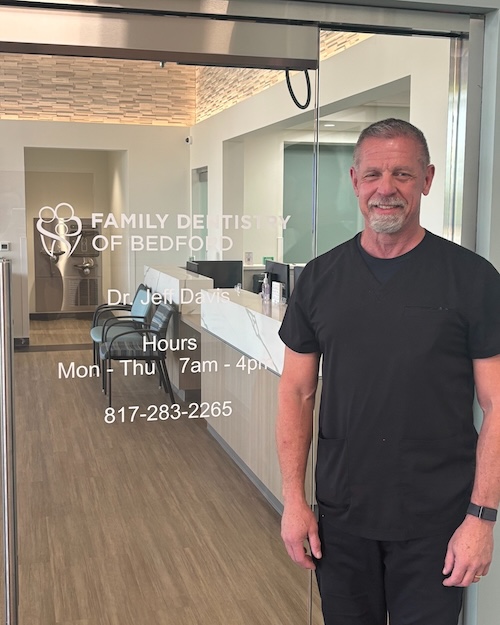 Dr. Jeff Davis in front of entrance to Family Dentistry of Bedford